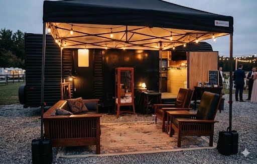 Mobile cigar lounge with leather seating and string lights